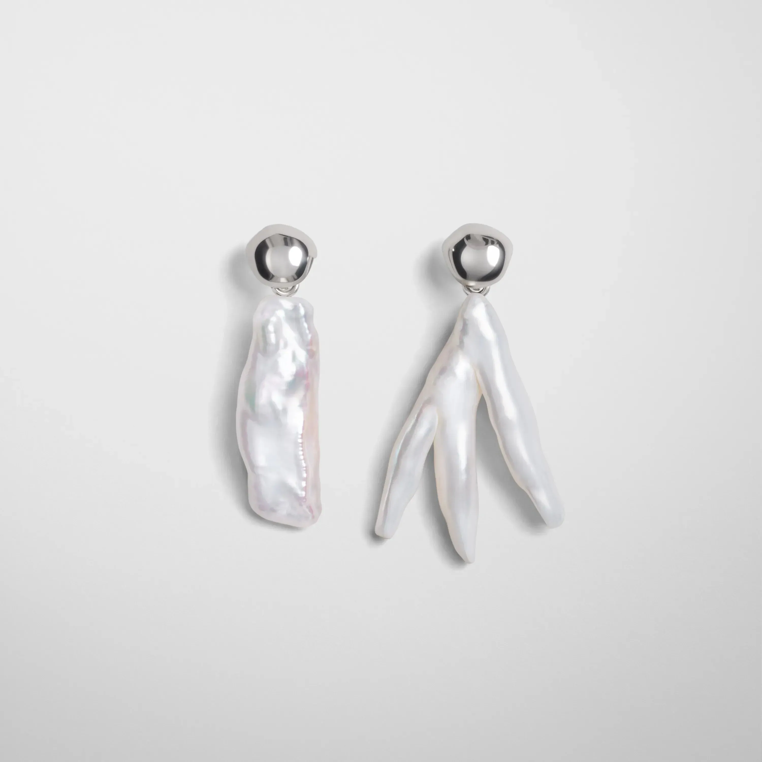 ASYMMETRIC PEARL EARRINGS | silver pearls