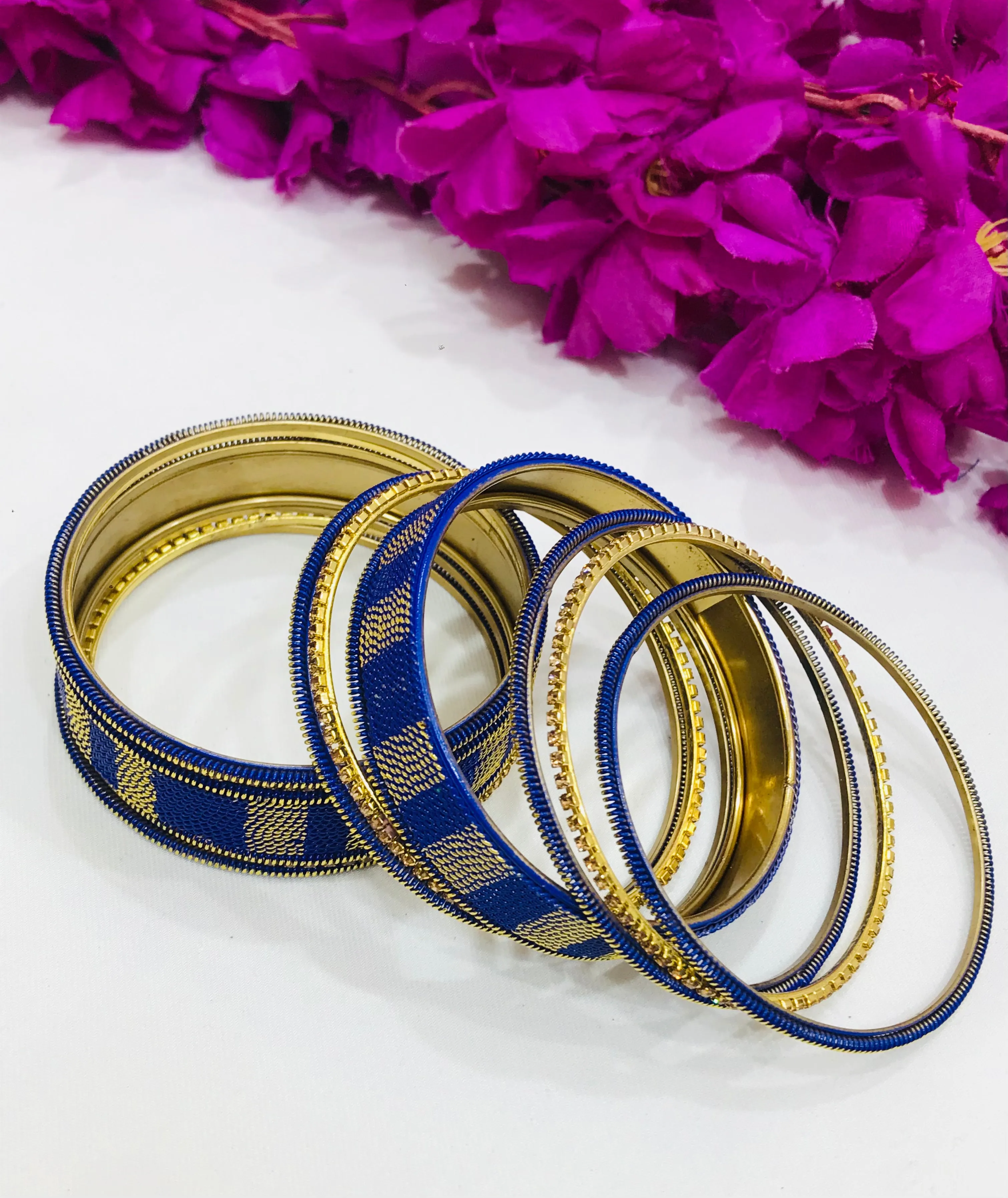 Charming Blue Color Metal Bangles Set With Spiral Design For Women