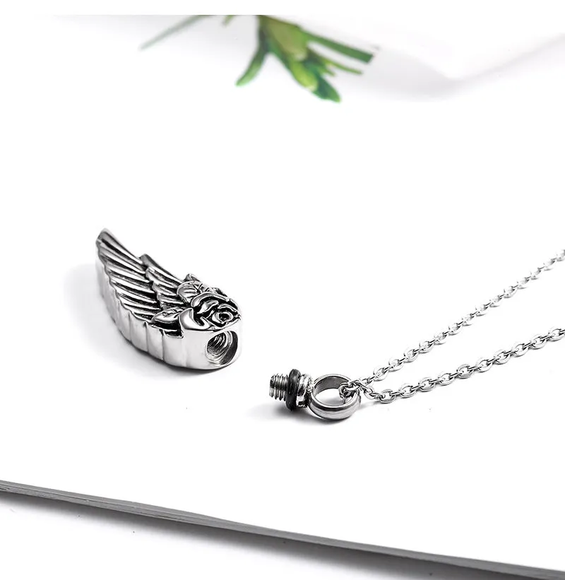 Feather and Rose - Gothic Perfume Bottle Necklace by The Nevermore