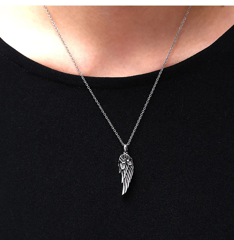 Feather and Rose - Gothic Perfume Bottle Necklace by The Nevermore