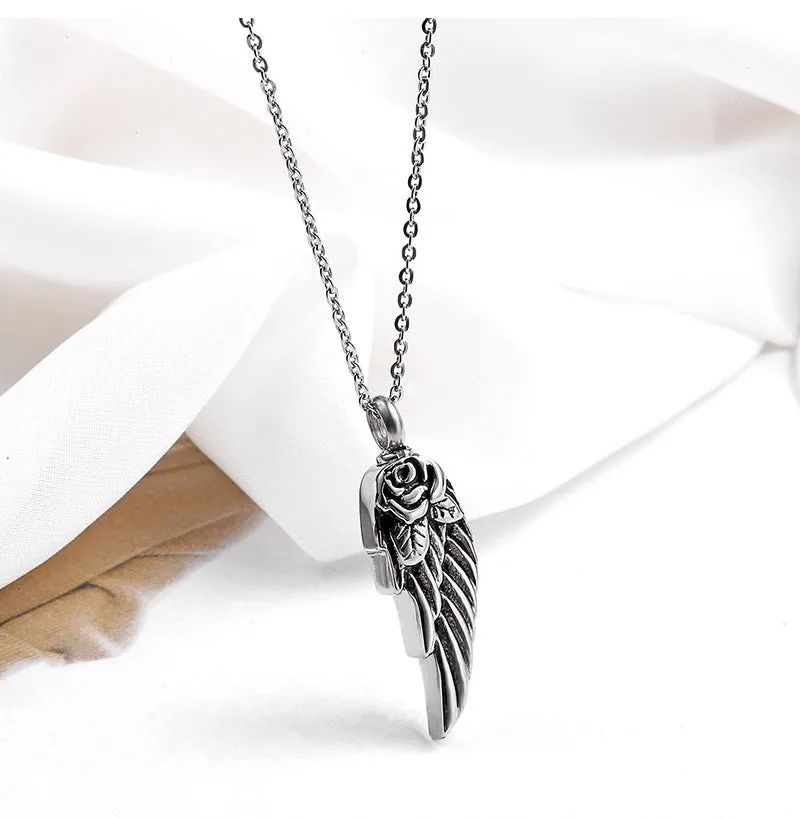 Feather and Rose - Gothic Perfume Bottle Necklace by The Nevermore