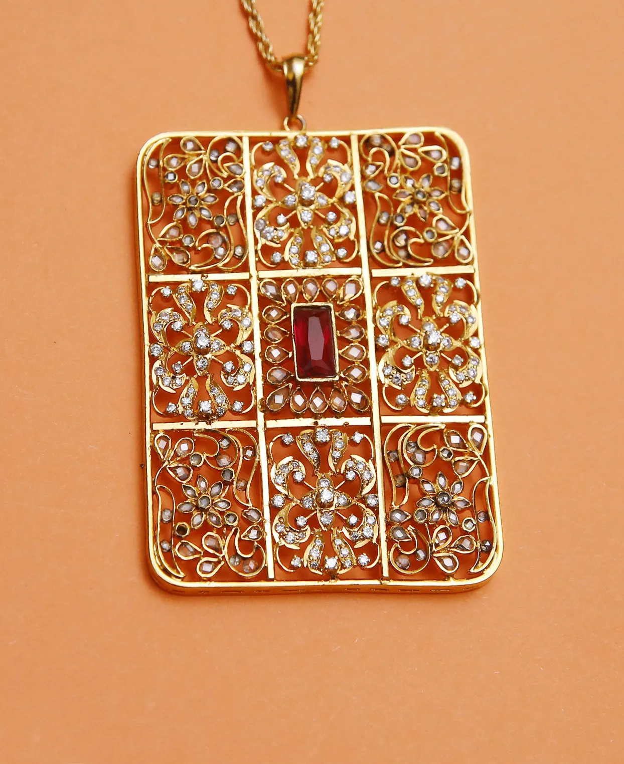 Handcrafted Box Pendant in Treated Rubies and Zircon