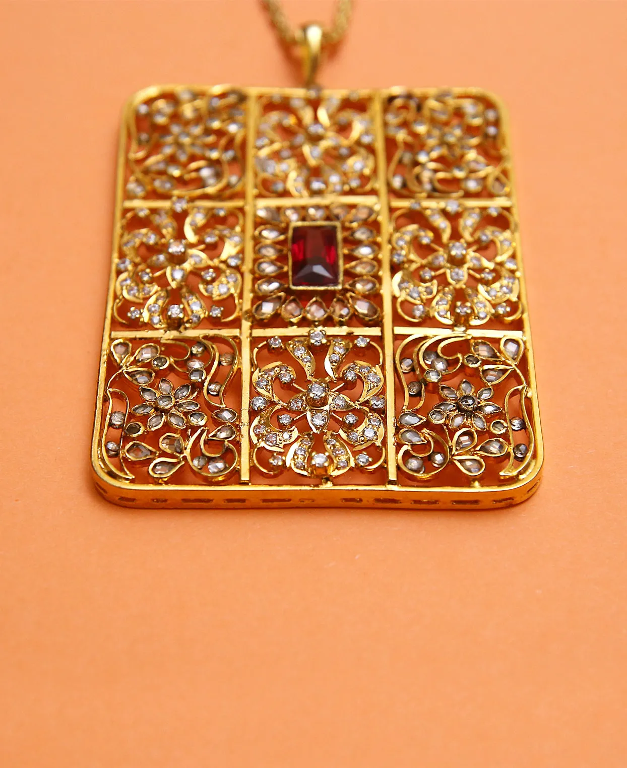 Handcrafted Box Pendant in Treated Rubies and Zircon