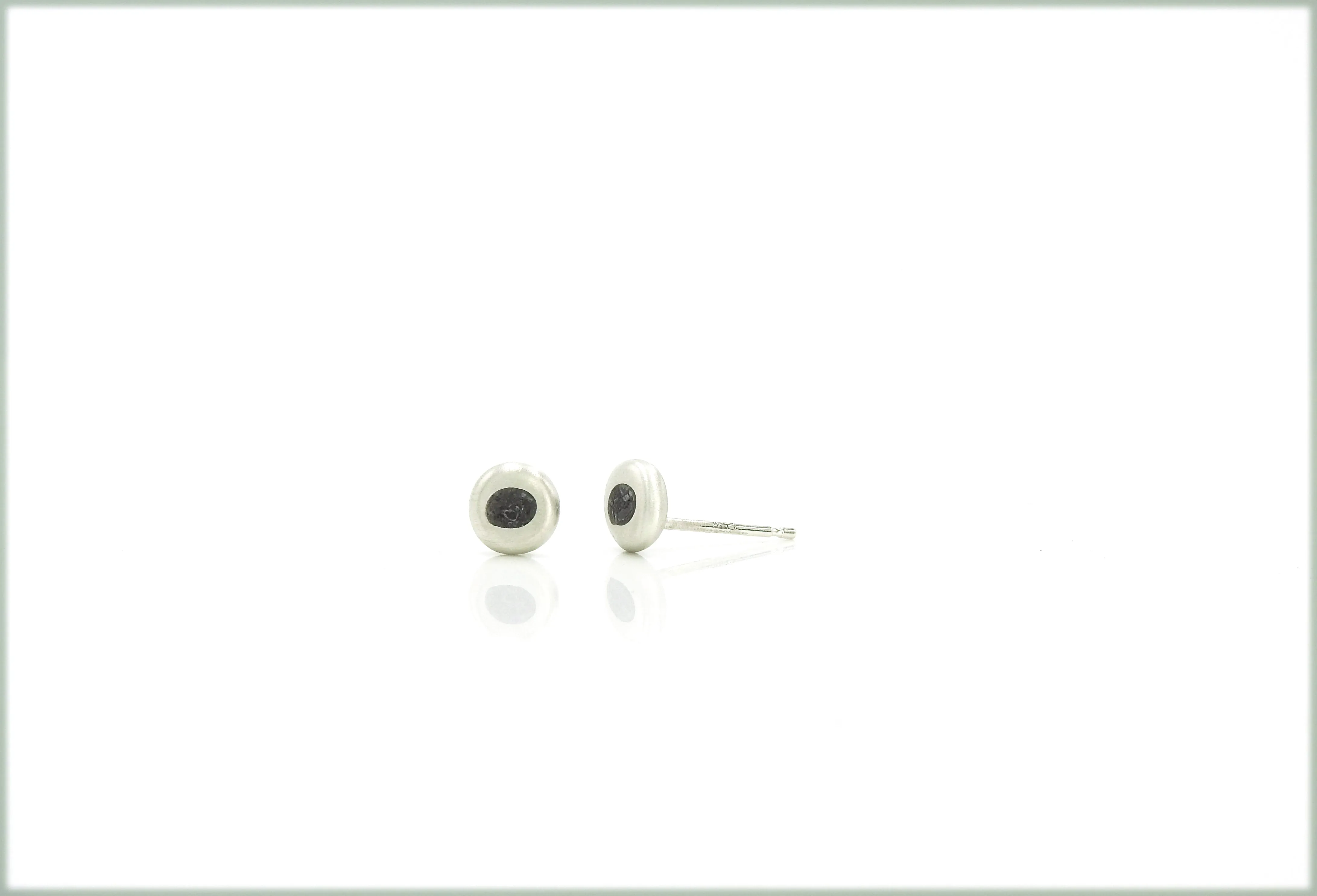 Pebble studs with limestone inlay
